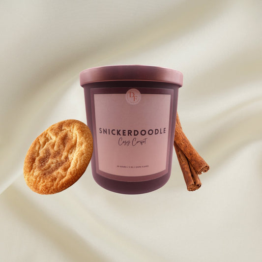 Experience warmth and comfort with our Snickerdoodle scented candles. Our natural wooden wicks will fill your home with the sweet aroma of freshly baked cookies, creating a cozy atmosphere perfect for snuggling up!